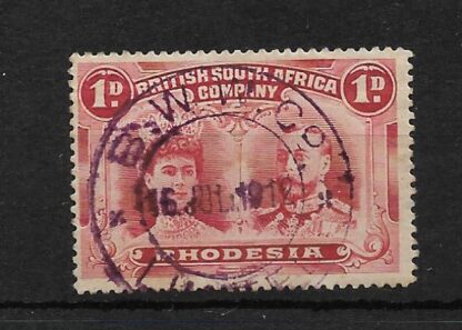Rhodesia Double Head One Penny with B W W Co LIMITED in violet (DC) postmark