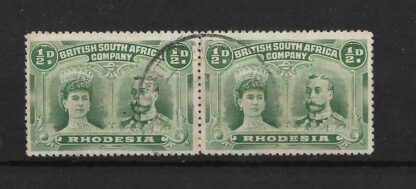 Rhodesia Double Head Halfpenny pair both with wedge flaws used
