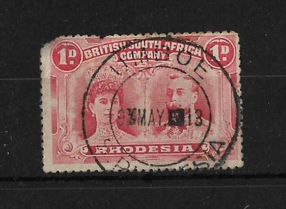 Rhodesia Double Head One Penny with an UMBOE blank after day and double blank for year (DC) postmark