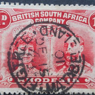 Rhodesia Double Head One Penny with FIGTREE Month and Day inverted (SC) postmark
