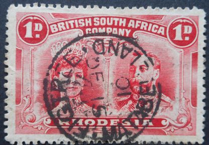 Rhodesia Double Head One Penny with FIGTREE Month and Day inverted (SC) postmark