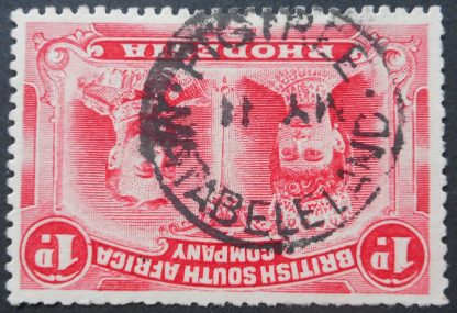 Rhodesia Double Head One Penny with FIGTREE Month and Day inverted No Year (SC) postmark