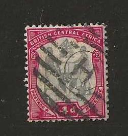 BCA/Nyasaland 1896 QV Four Pence Arms with a Barred Oval H postmark