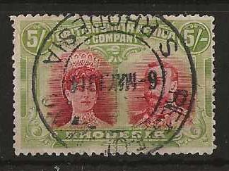 Rhodesia Double Head Five Shillings Crimson and Yellow Green SG 160a with a REGD BULAWAYO postmark