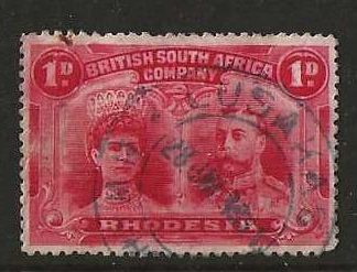 Rhodesia Double Head One Penny with a LUSAKAS (DC) in blue postmark