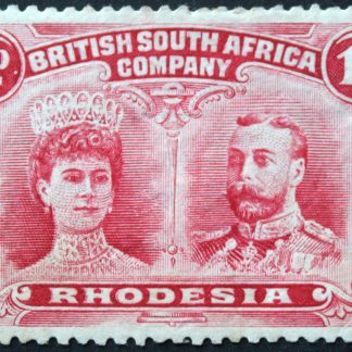 Rhodesia Double Head One Penny with retouch on RHO of RHODESIA pos 63 mounted mint